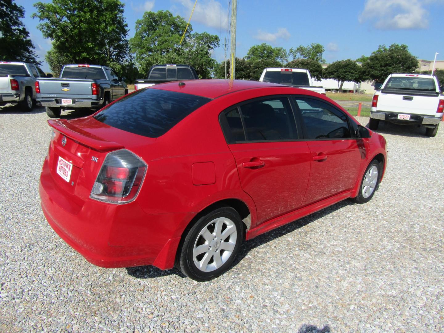 2012 Red /Gray Nissan Sentra 2.0 (3N1AB6AP4CL) with an 2.0L L4 DOHC 16V engine, Automatic transmission, located at 15016 S Hwy 231, Midland City, AL, 36350, (334) 983-3001, 31.306210, -85.495277 - Photo#7